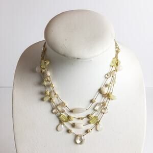 Vintage multistrand gold brass beaded necklace with resin rosettes roses